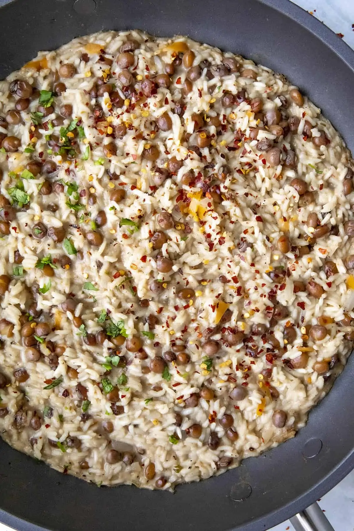 Jamaican Rice and Peas in a hot pan.