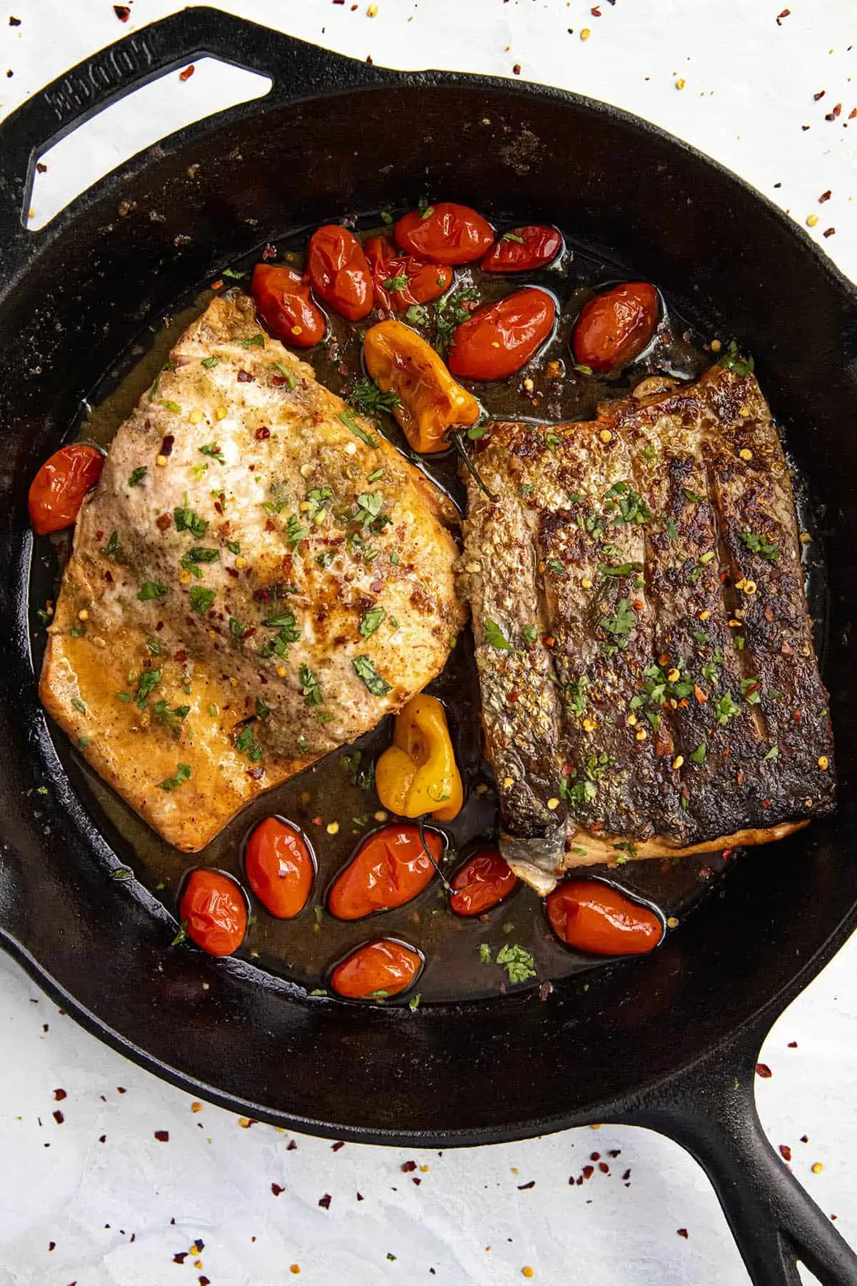 Jerk Salmon in a skillet.