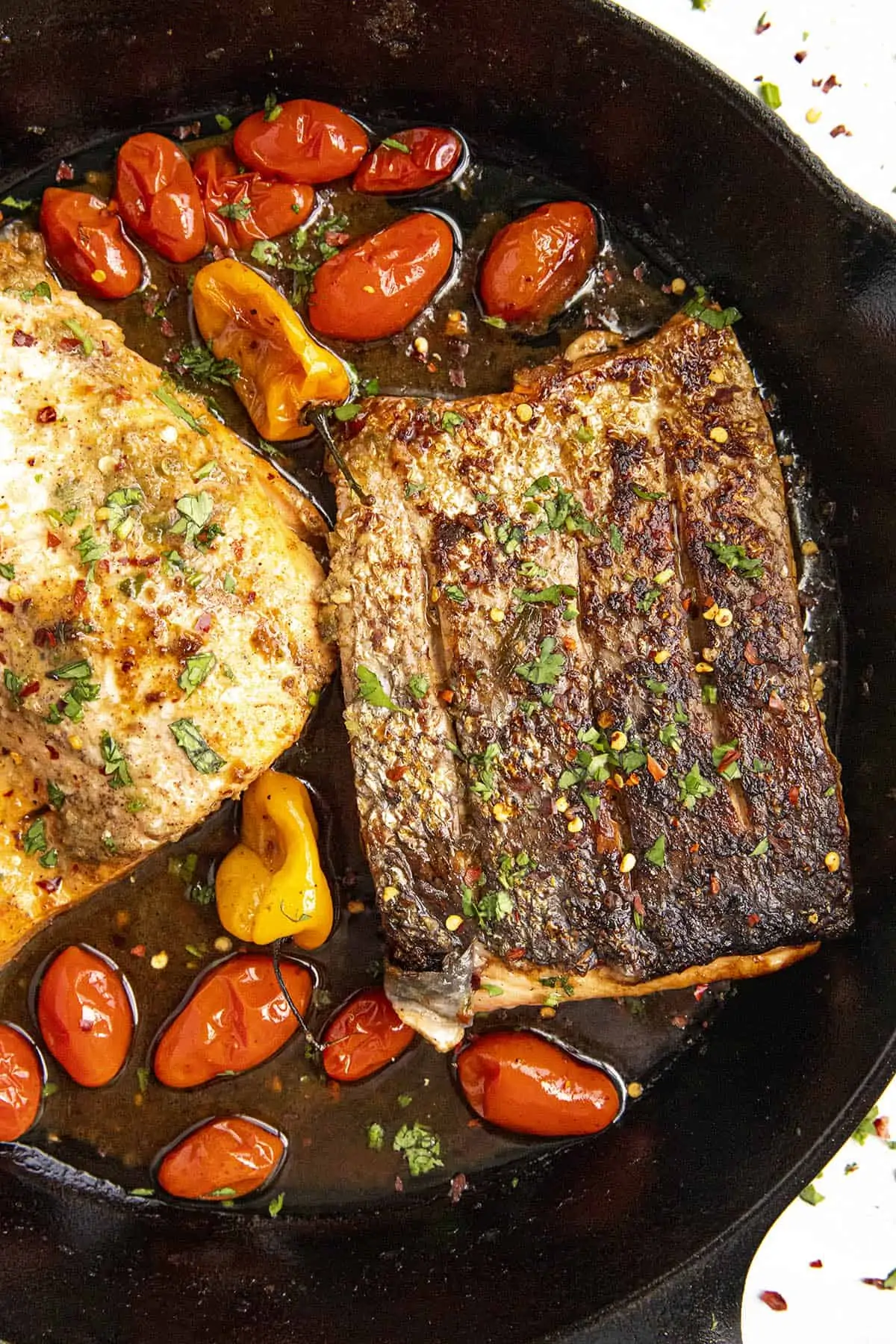 Jerk Salmon in a hot pan.