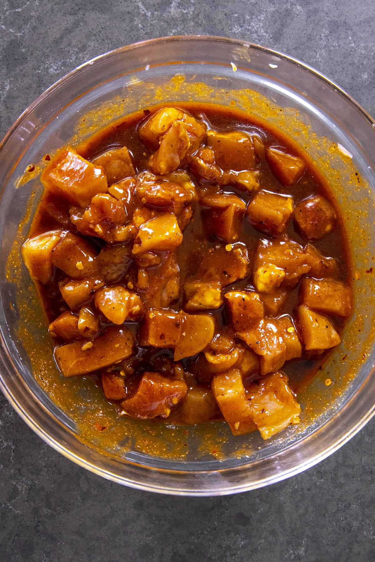 Chicken marinating in a spicy Korean sauce