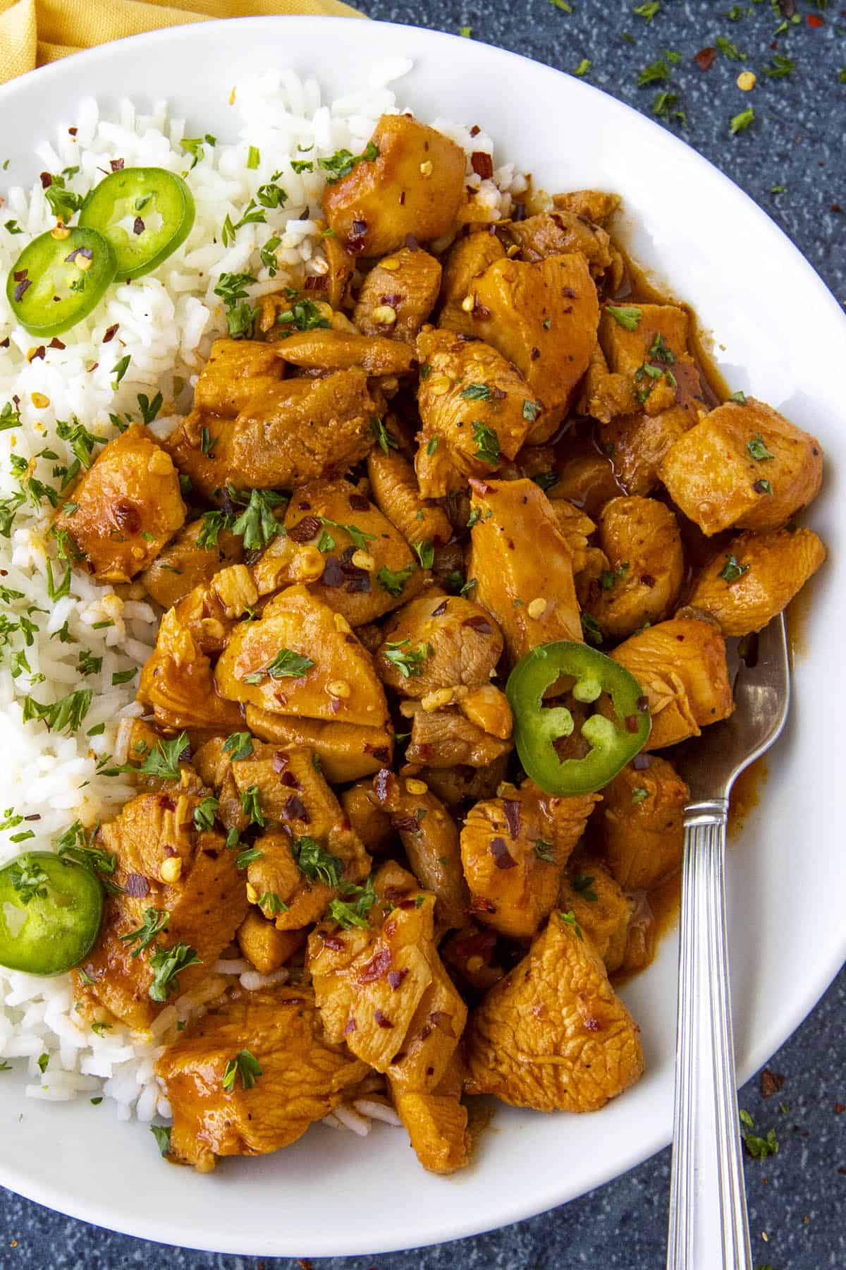 Korean Chicken in a bowl with rice.