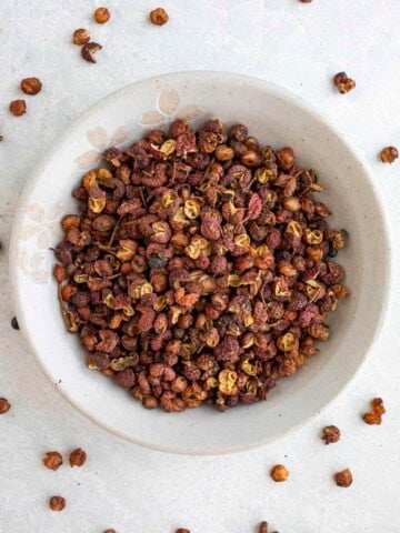 Sichuan peppercorns in a bowl.