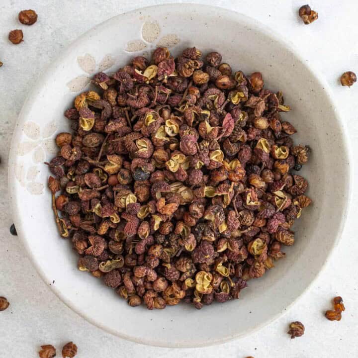 Sichuan peppercorns in a bowl.