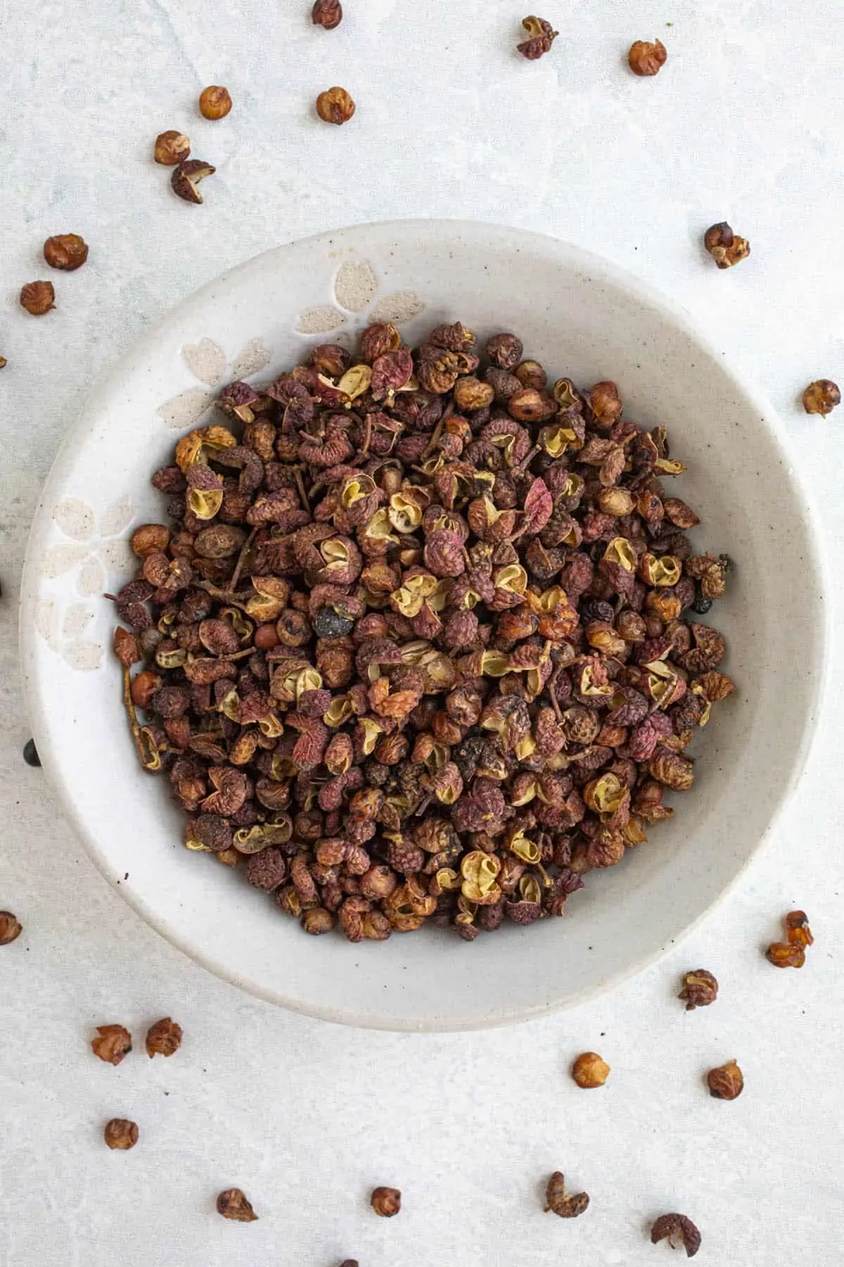 Sichuan peppercorns in a bowl.