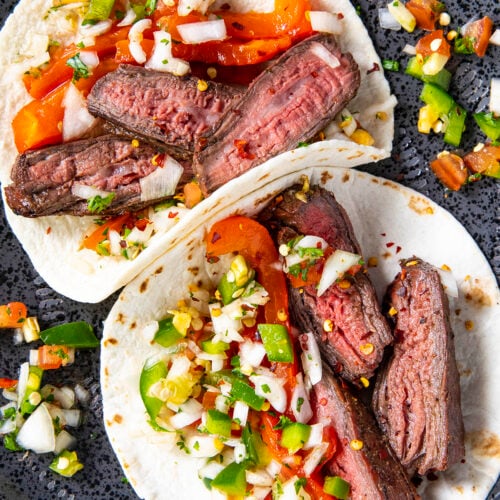 Two charcoal grilled steak tacos