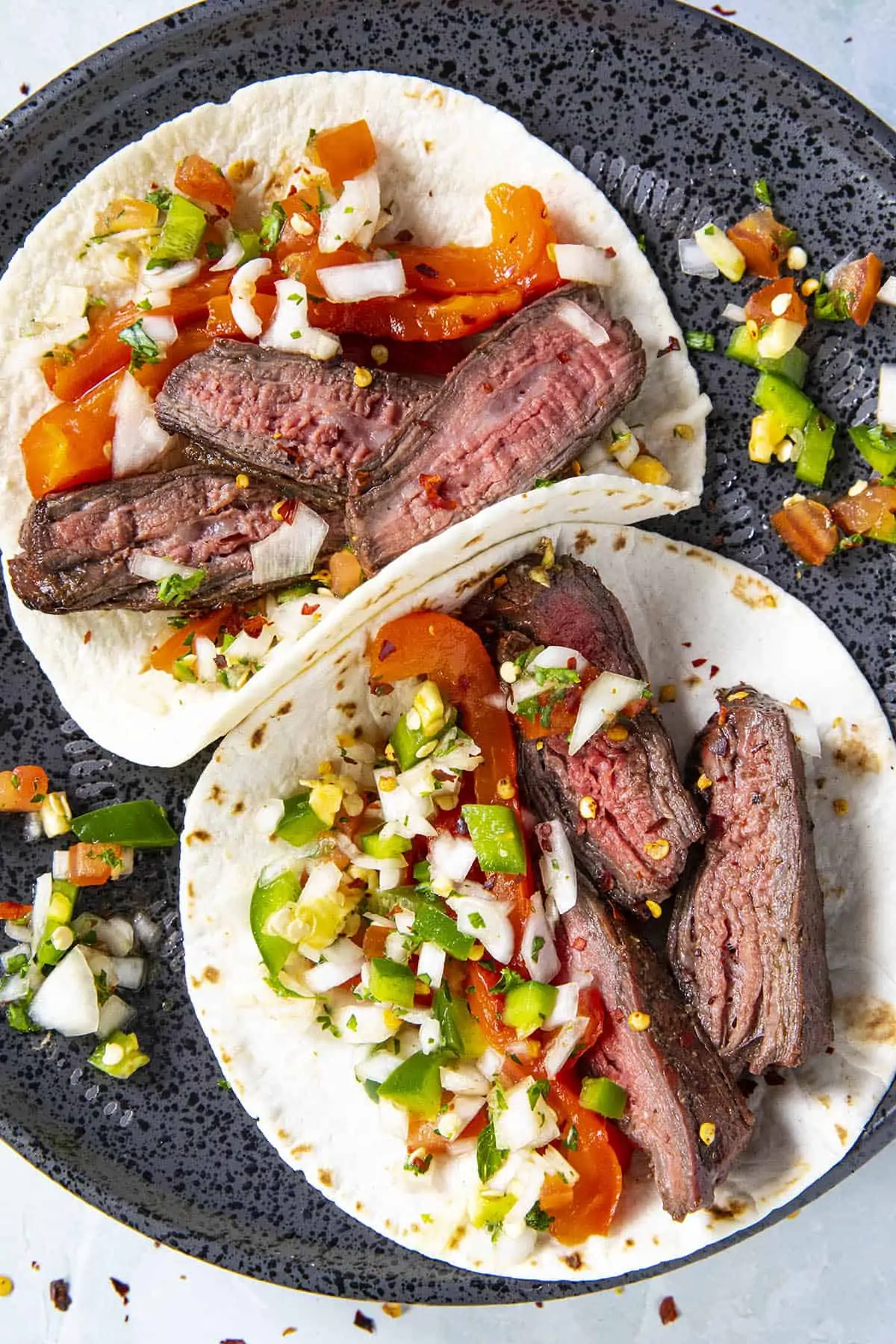 Two charcoal grilled steak tacos.