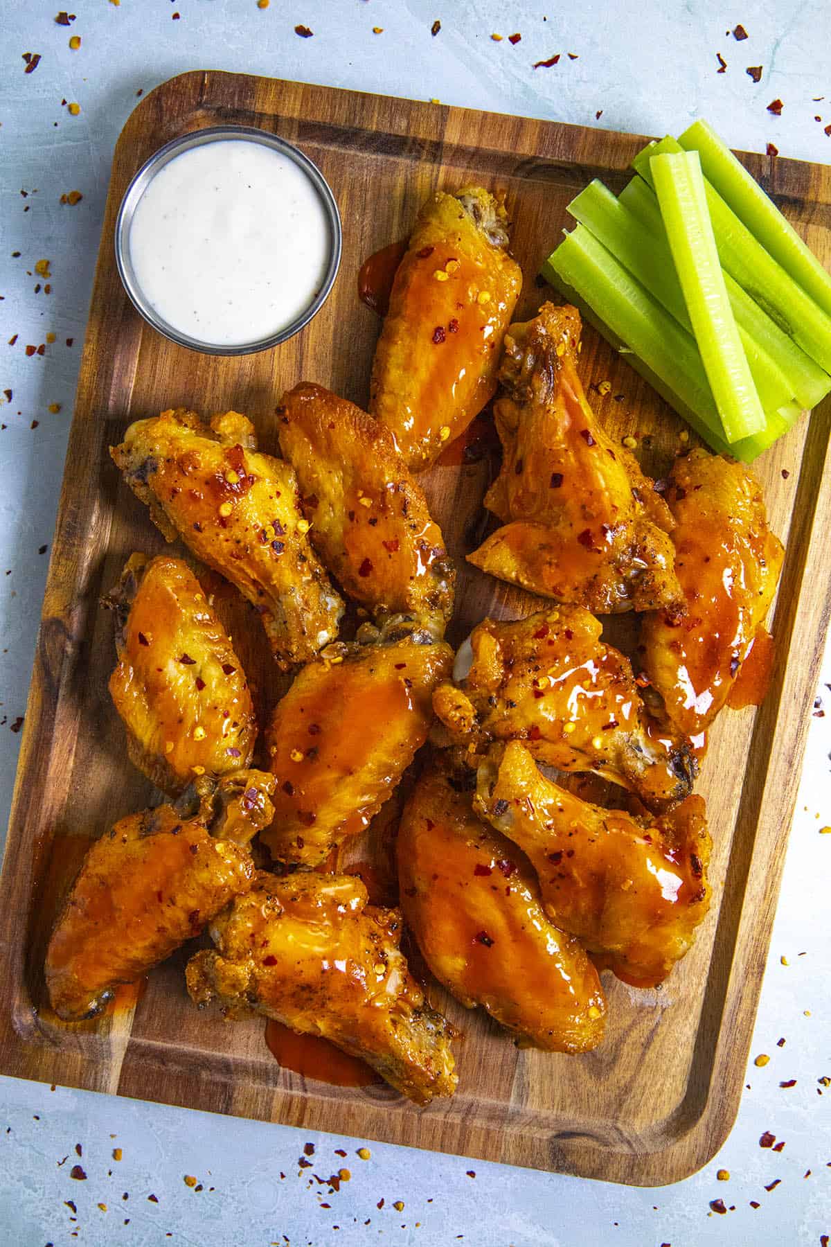 Buffalo Wings on a platter with extra Buffalo sauce