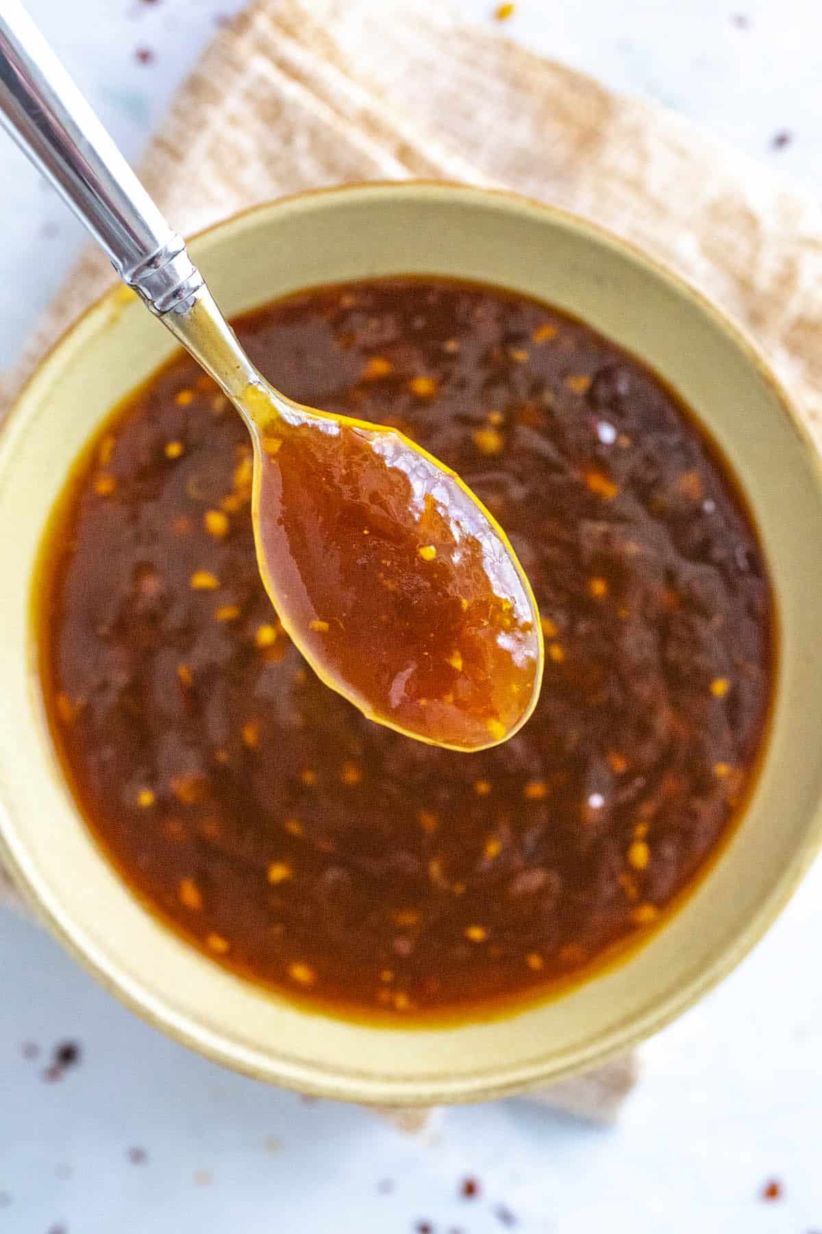 Mike taking a spoonful of General Tso Sauce