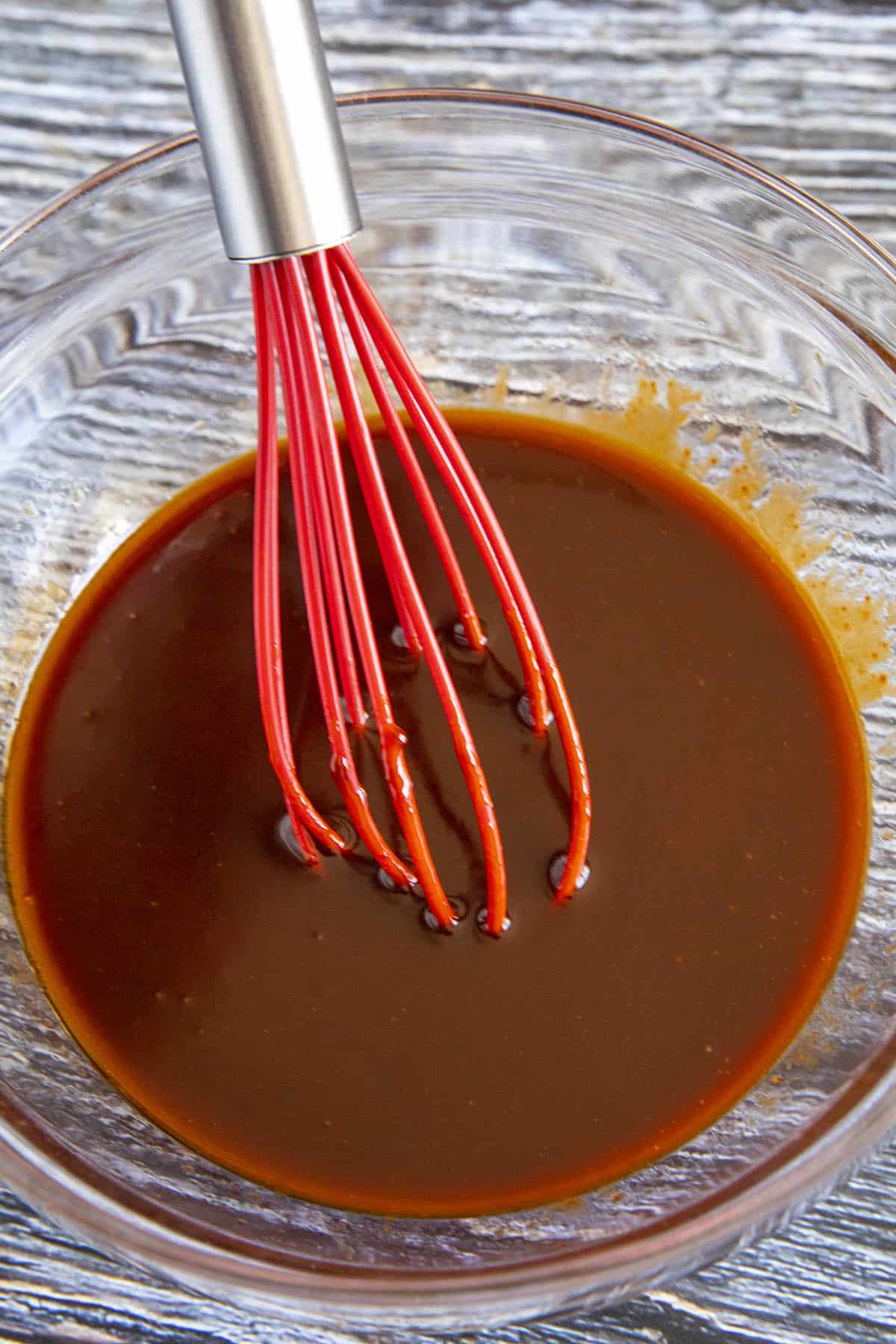 Whisking Gochujang Sauce in a bowl