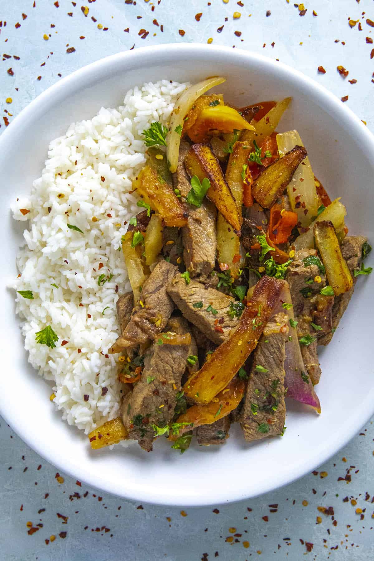 Peruvian Beef Stir Fry with French Fries (Lomo Saltado) in a bowl