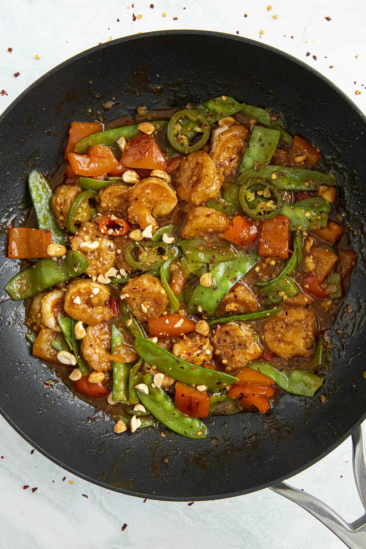 Szechuan Shrimp in a pan with lots of shrimp and vegetables
