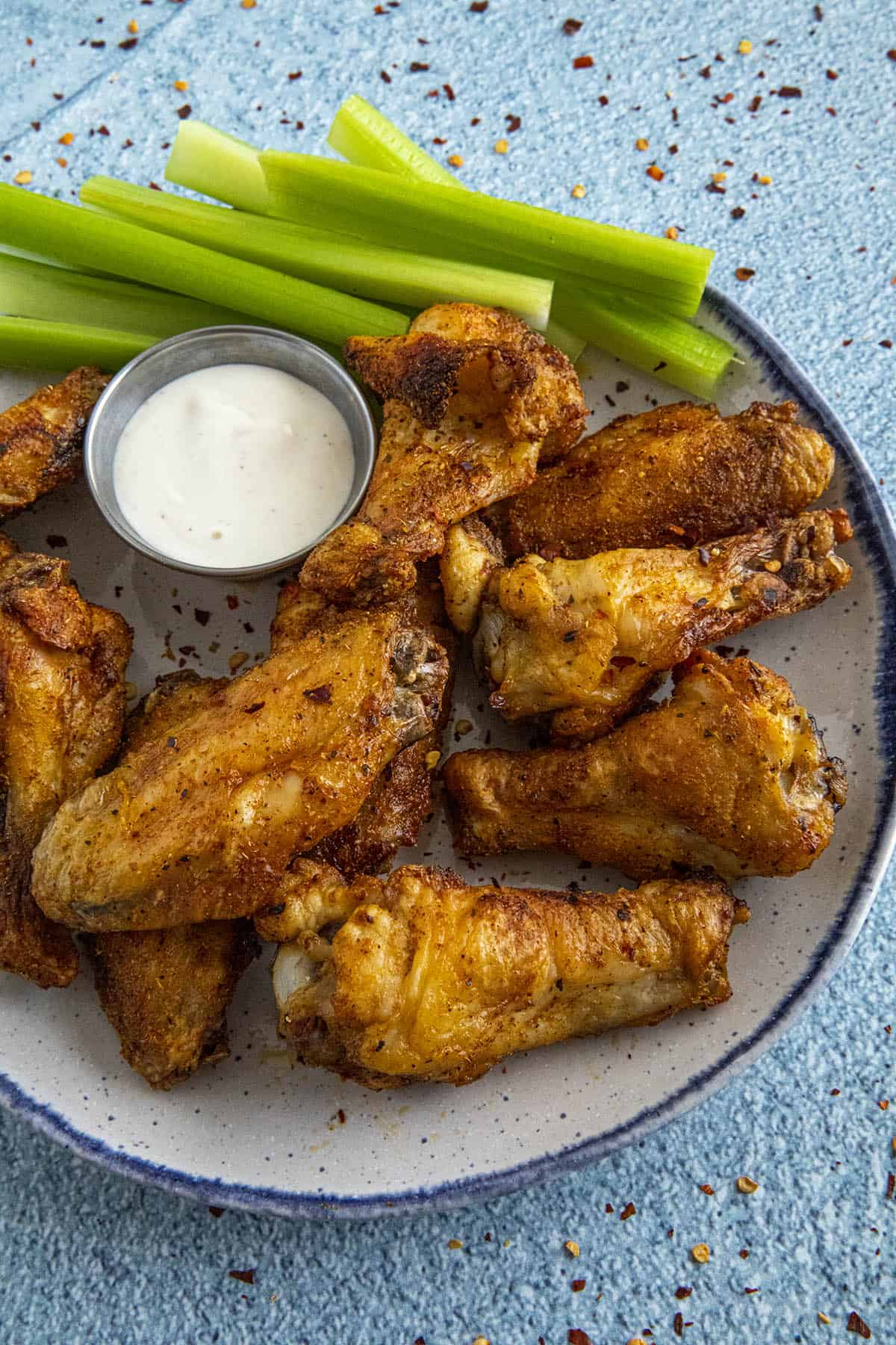 Crispy Air Fryer Chicken Wings with celery and ranch dressing