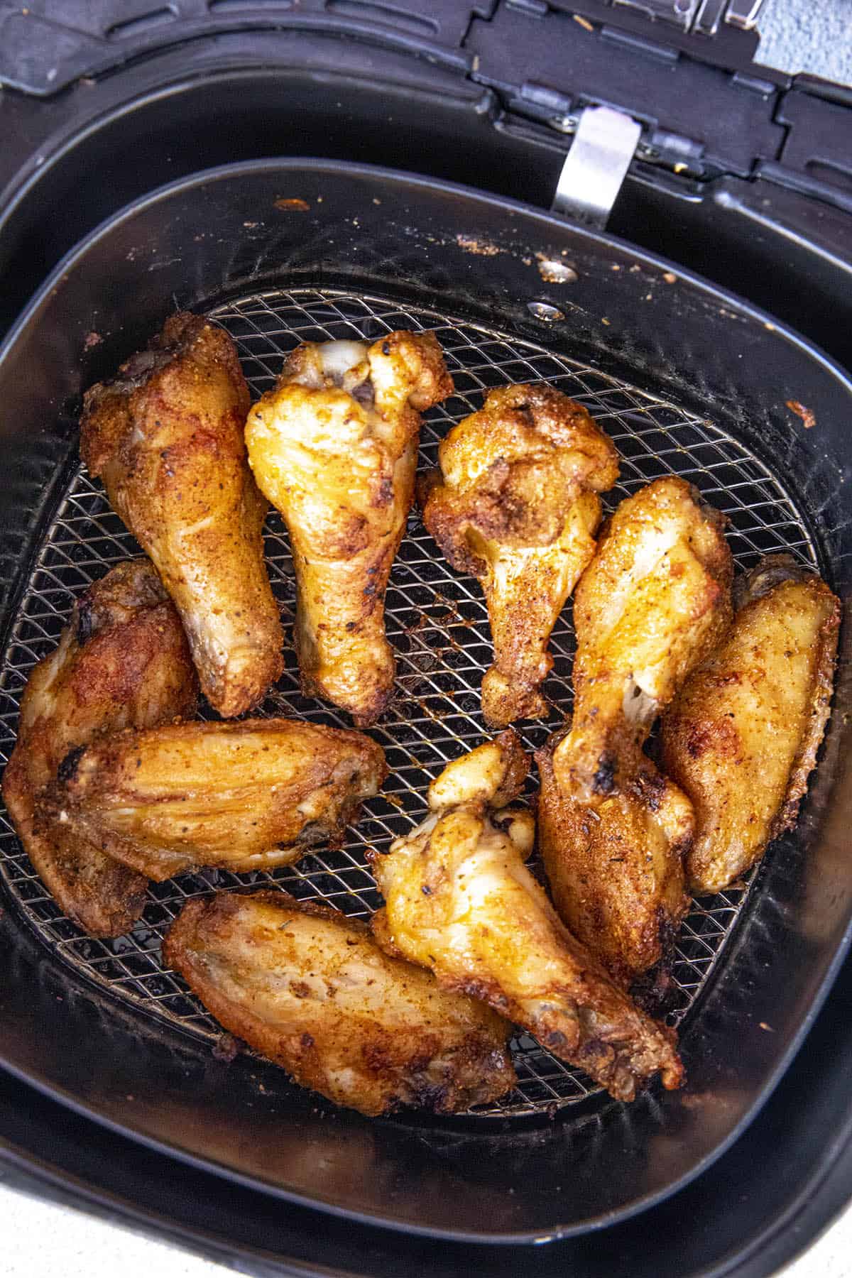 Crispy Air Fryer Chicken Wings in the air fryer basket