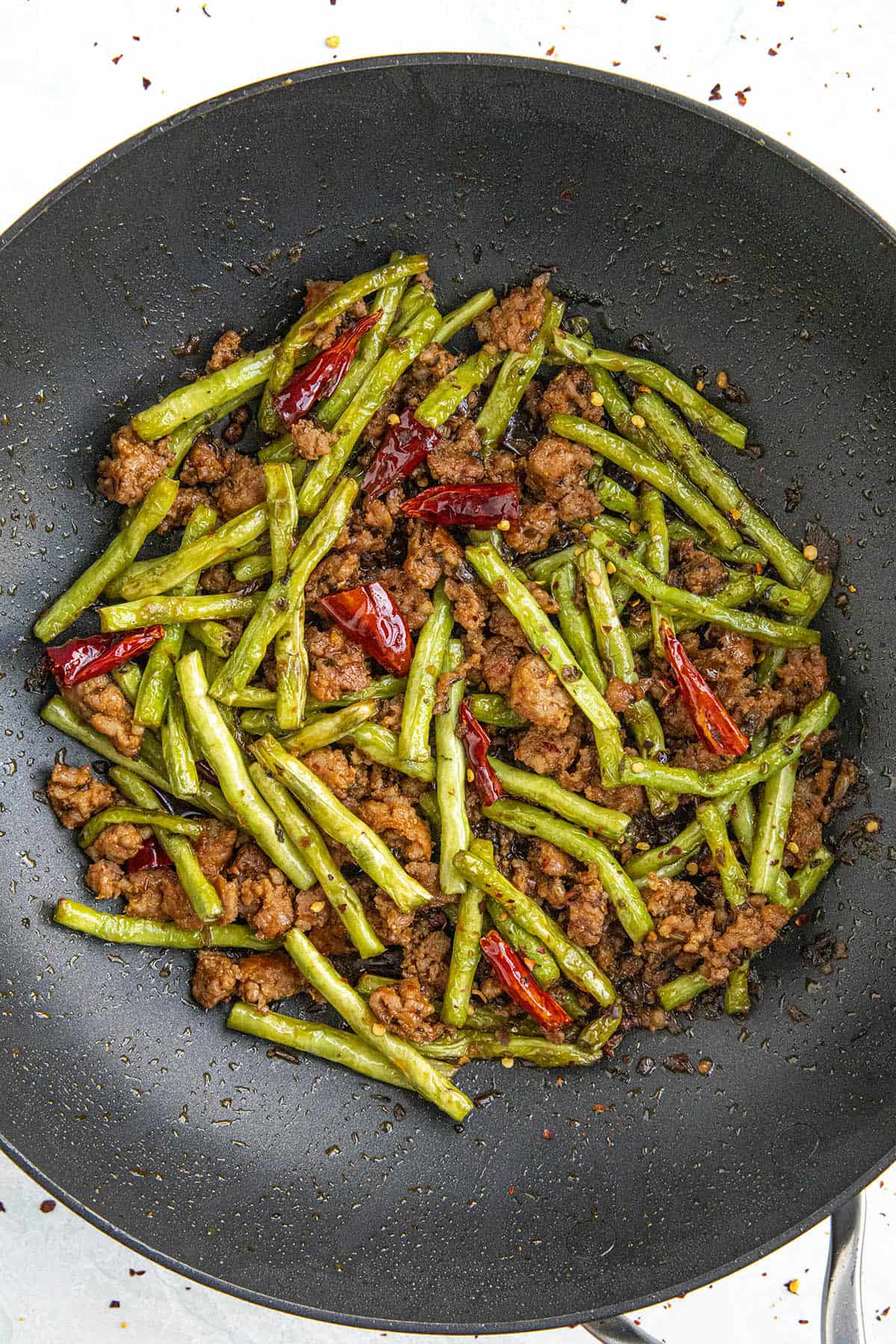 Sichuan Dry Fried Green Beans Recipe in a pan, ready to serve
