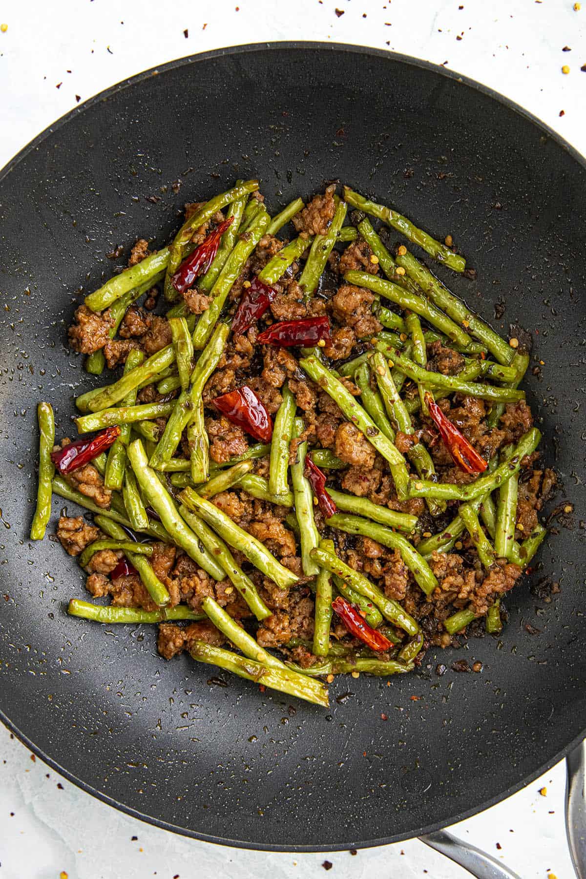 Szechuan Dry Fried Green Beans in a hot pan