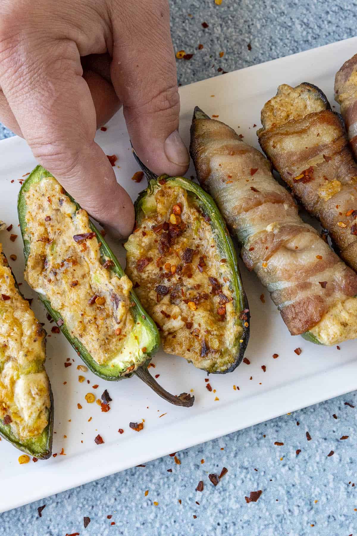 Mike grabbing a Grilled Jalapeno Poppers