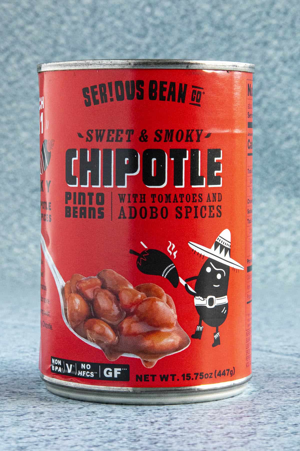 A can of Serious Bean Co. Sweet & Smoky Chipotle Pinto Beans with Tomatoes and Adobo Spices.