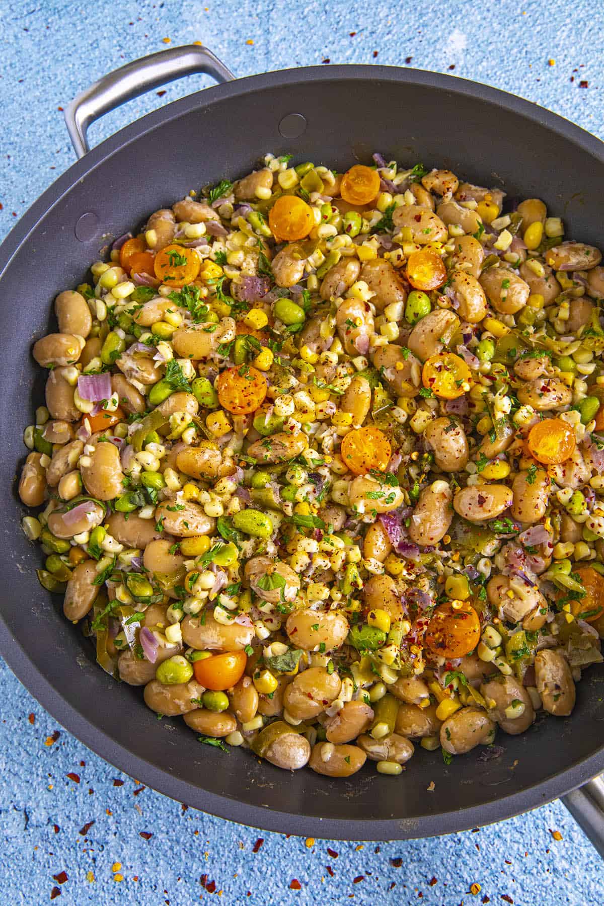 Butter bean succotash in a pan, ready to serve