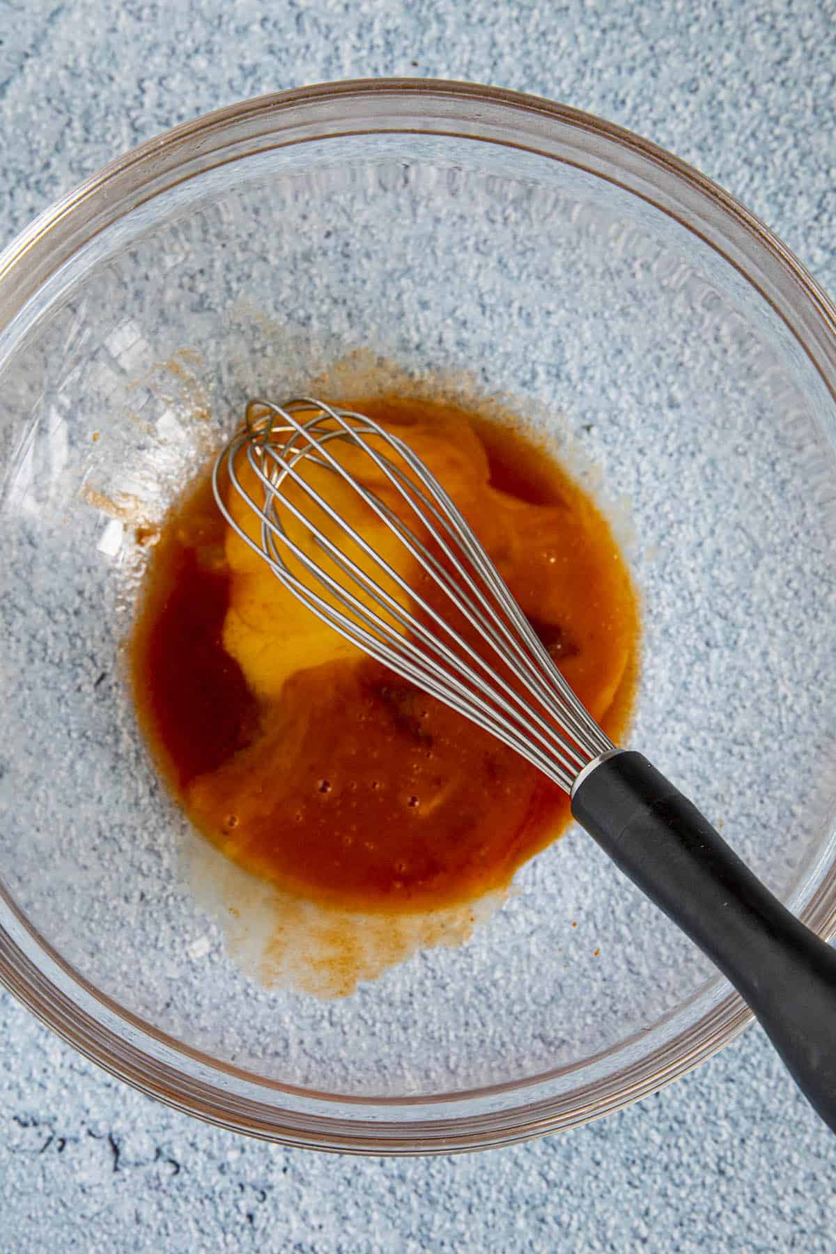 Starting to whisk the Chipotle Aioli in a bowl
