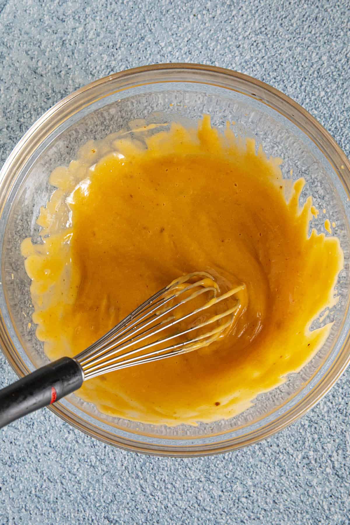 Whisking the Chipotle Aioli in a bowl