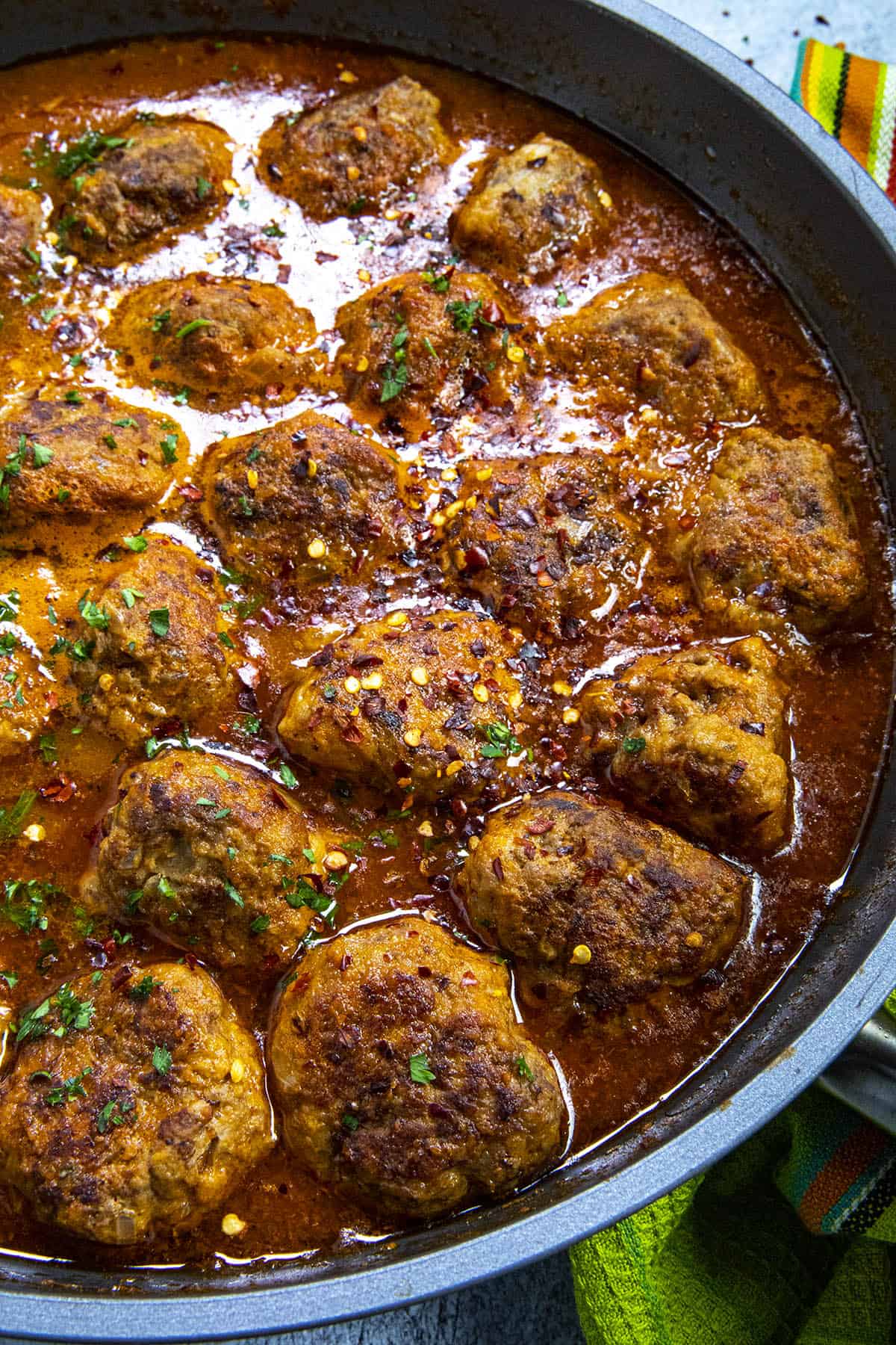 Mexican meatballs (Albondigas) simmering in soup gravy