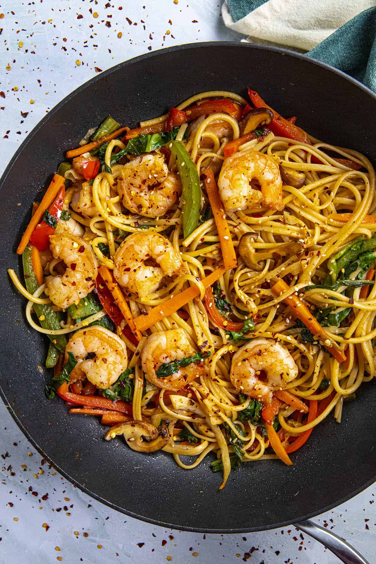 Lo Mein noodles in a pan with lots of shrimp