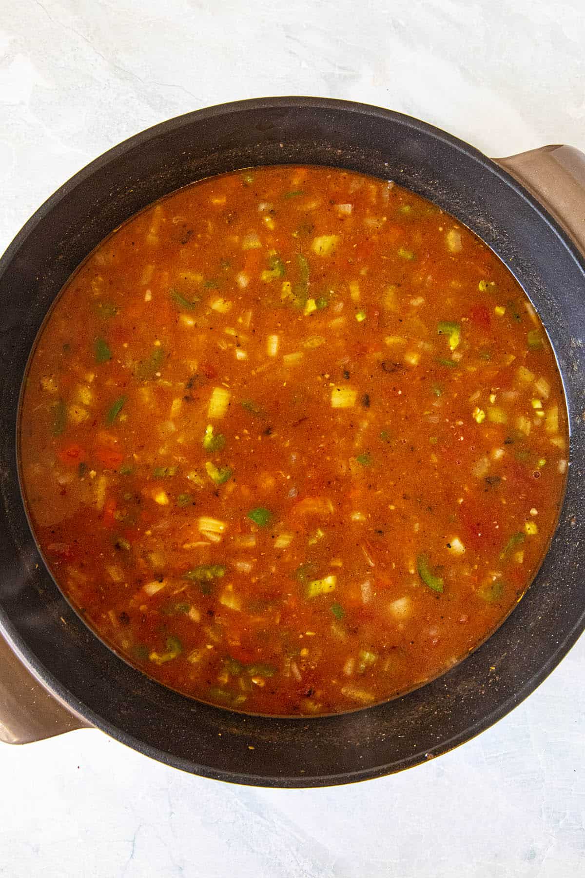 Starting to simmer the shrimp gravy in the pot