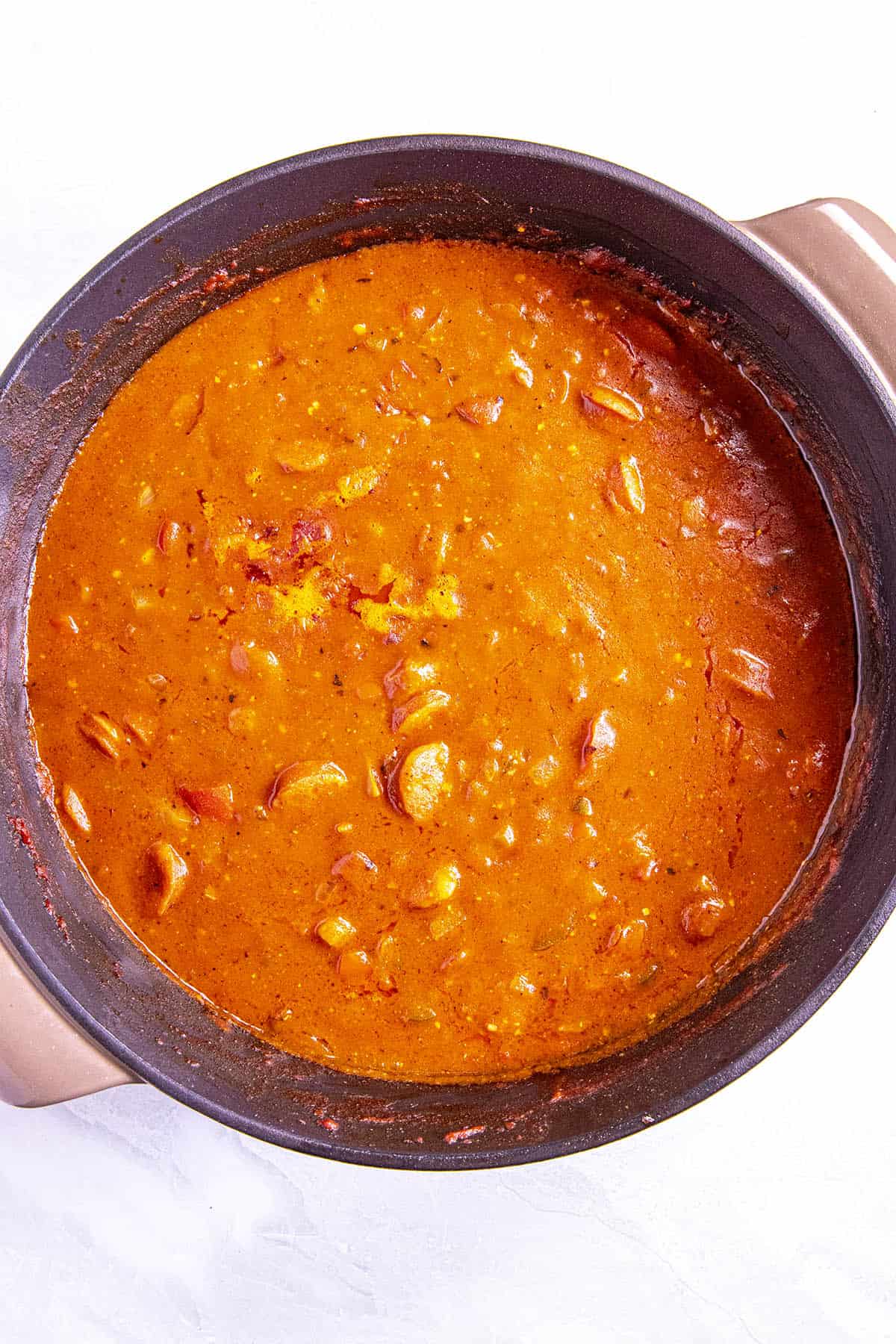 Simmering the shrimp gravy in the pot