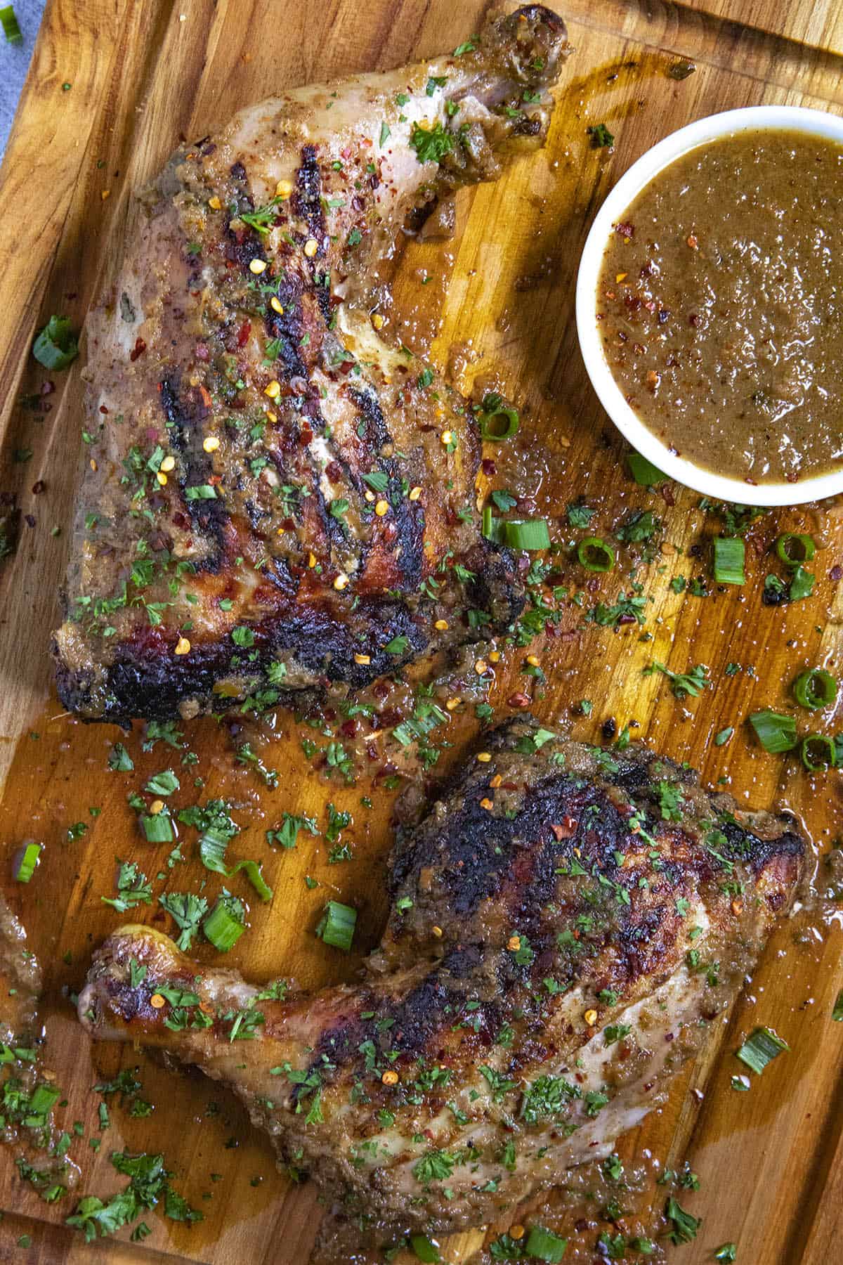 Jerk Chicken on a serving platter with garnish
