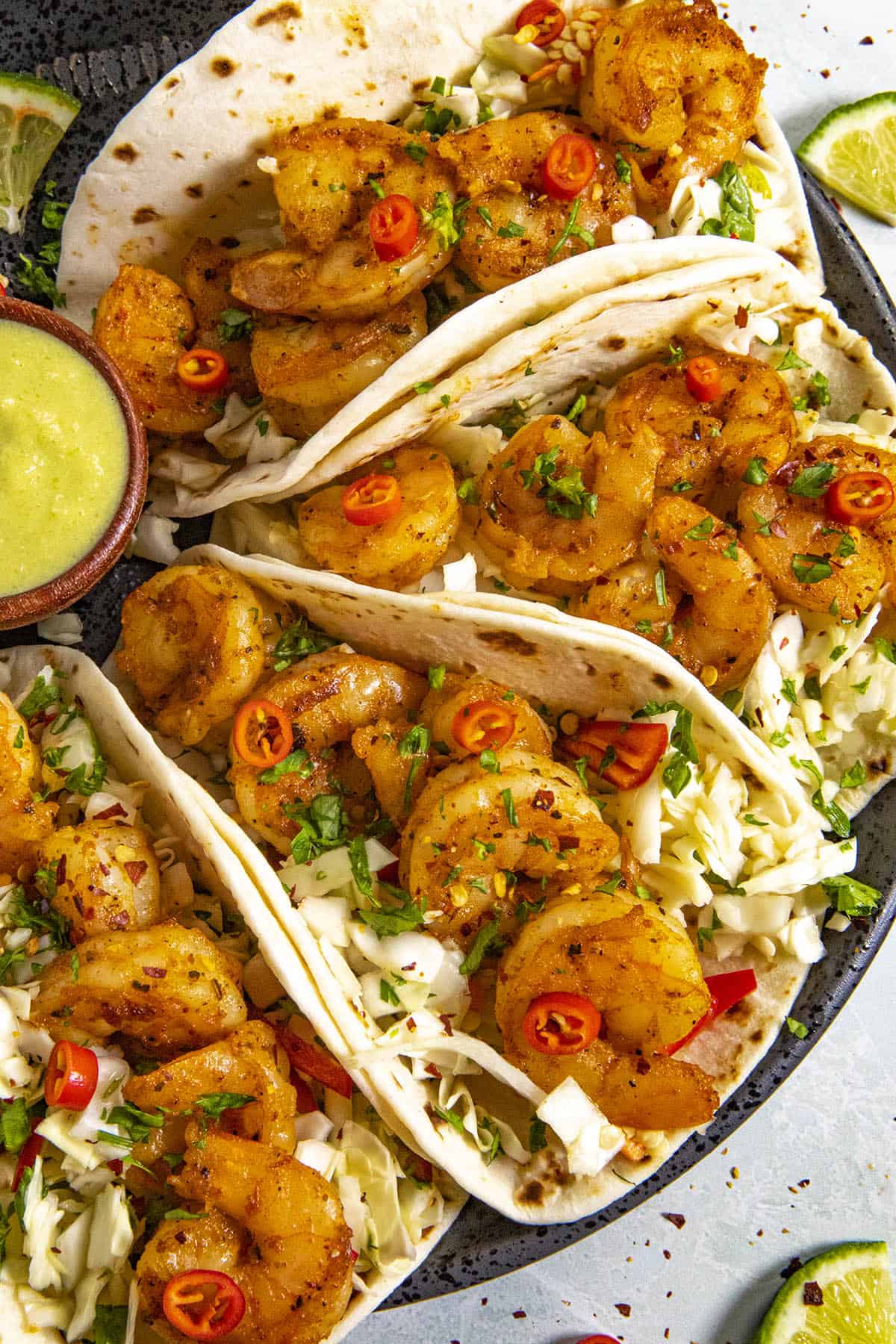 Shrimp Tacos on a plate with garnish