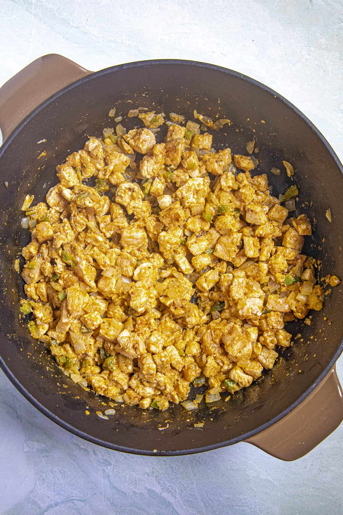 Cooking the chicken to make Southwest-style Chicken Soup