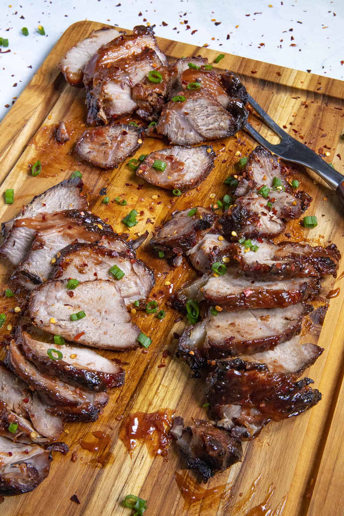 Slices of Chinese BBQ Pork (Char Siu) on a platter