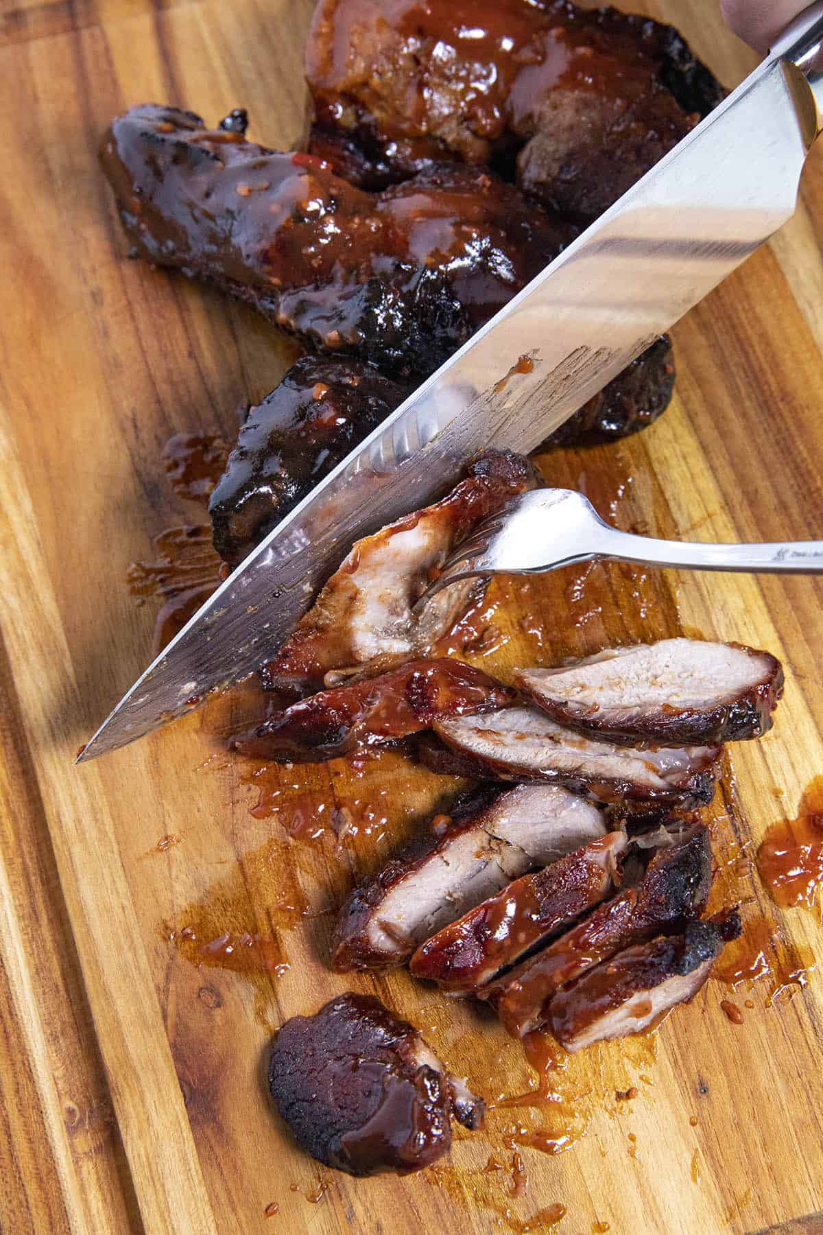 Mike slicing the Char Siu (Chinese BBQ Pork)