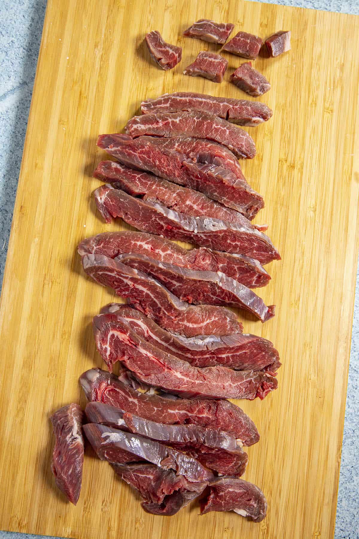 Slicing the beef on a cutting board