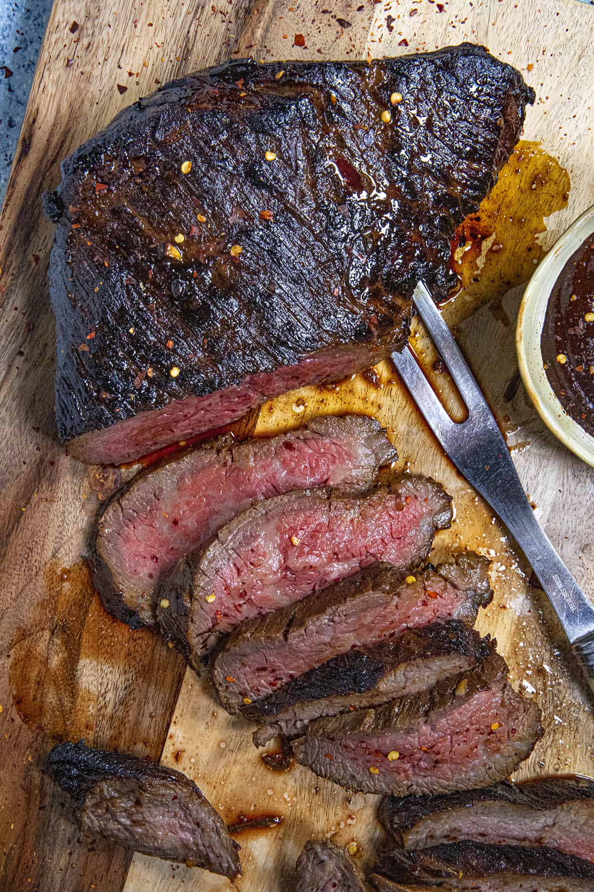 Sliced marinated tri tip steaks, ready to serve