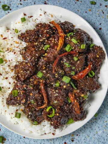 Mongolian Beef on a plate with rice