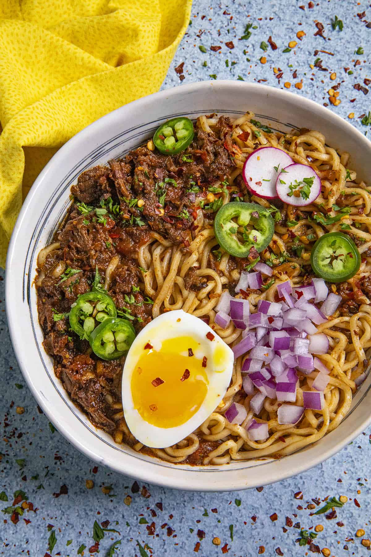 Birria Ramen in a bowl with a soft boiled egg