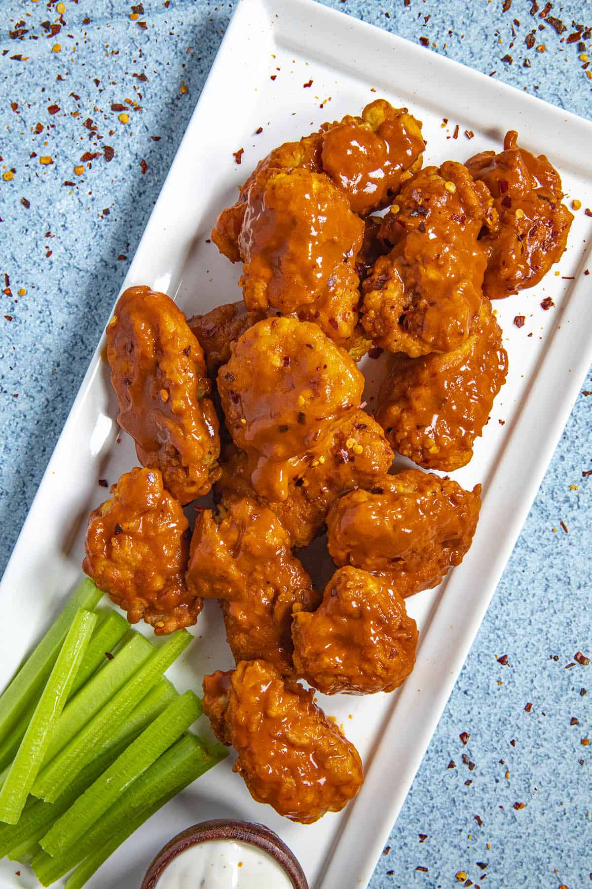 Saucy Boneless Buffalo Wings on a platter ready to serve