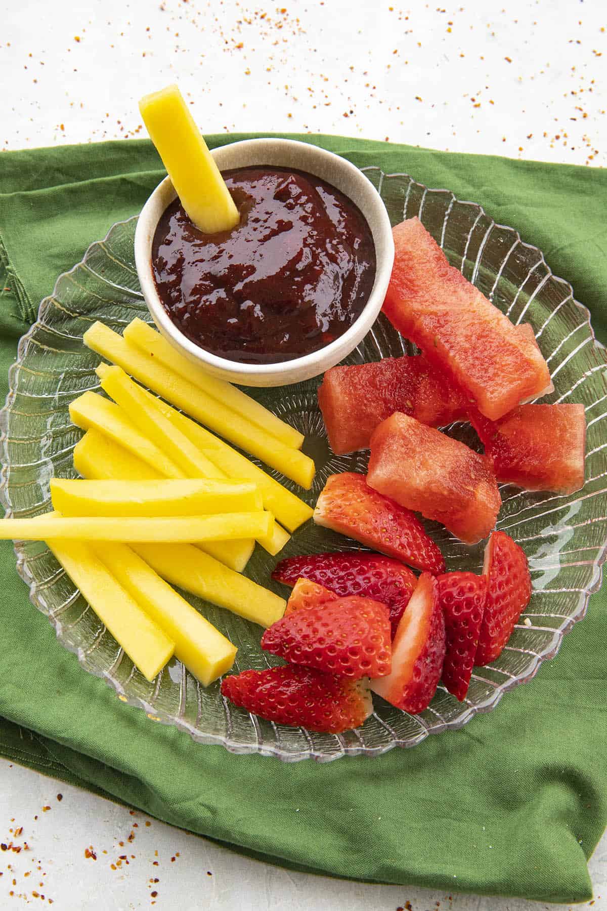 Fruit served on a platter with Chamoy Sauce for dipping