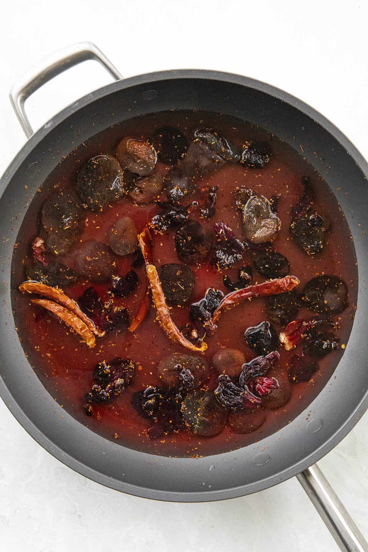 Starting to simmer ingredients in a pan to make chamoy sauce
