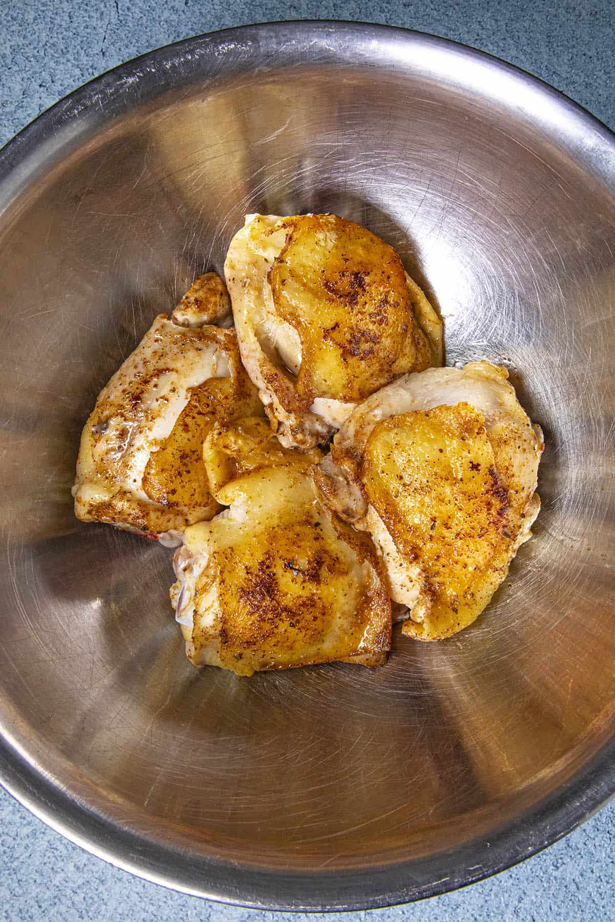 Browning chicken thighs to make Chicken Fricassee