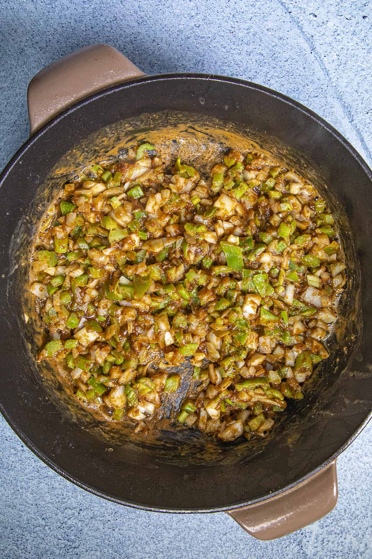 Cooking the vegetables to make Chicken Fricassee