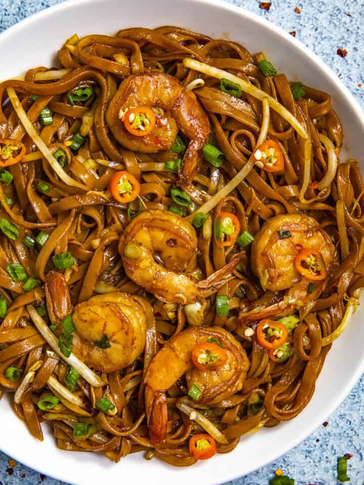 Mie Goreng, Indonesian stir fry noodles, in a bowl with lots of shrimp