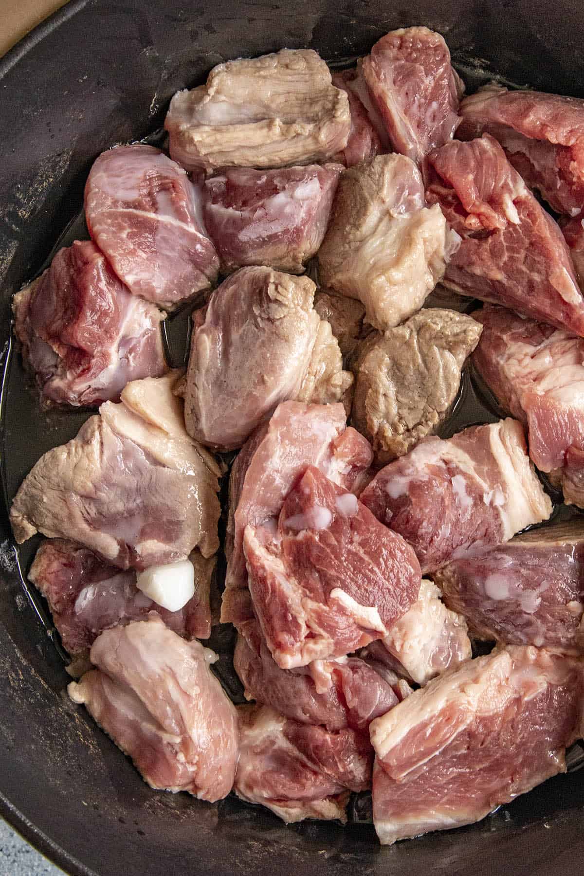 Browning the pork chunks to make Pork Carnitas
