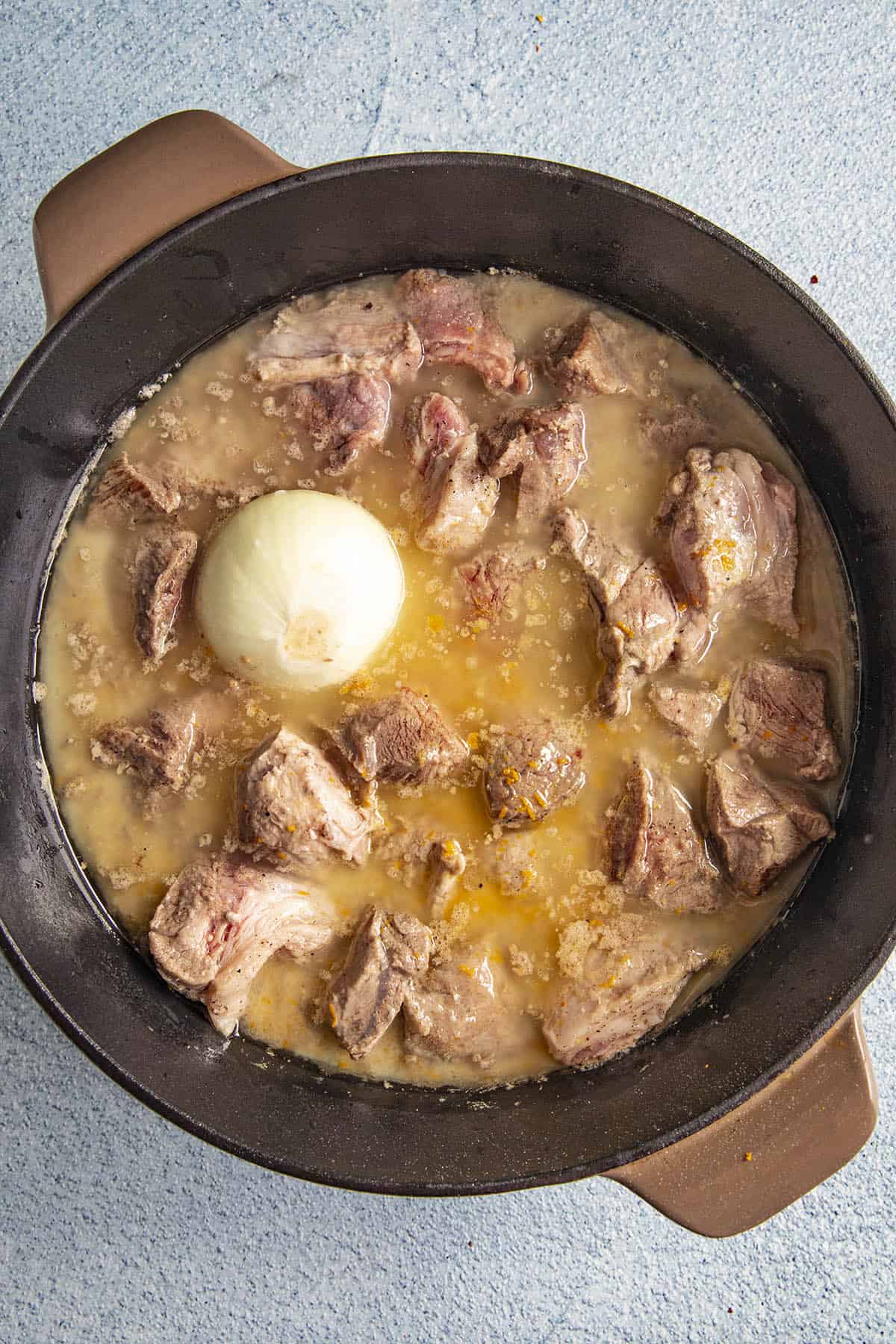 Pork Carnitas simmering in lard, orange juice and milk