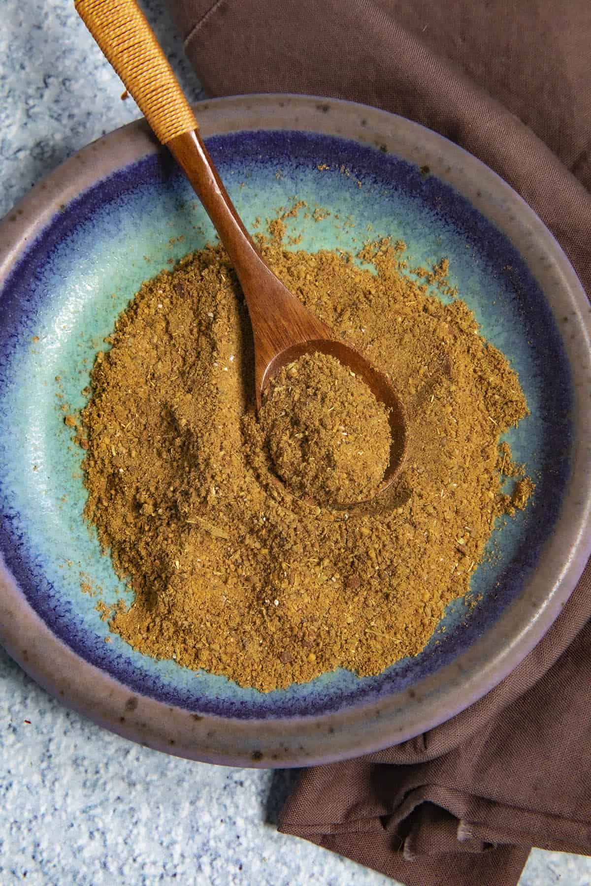 Freshly ground Garam Masala on a spoon