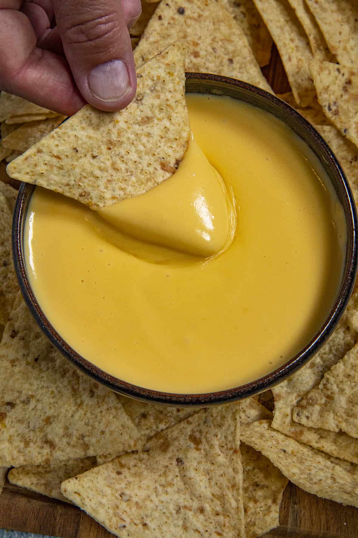 Nacho Cheese Sauce on a tortilla chip