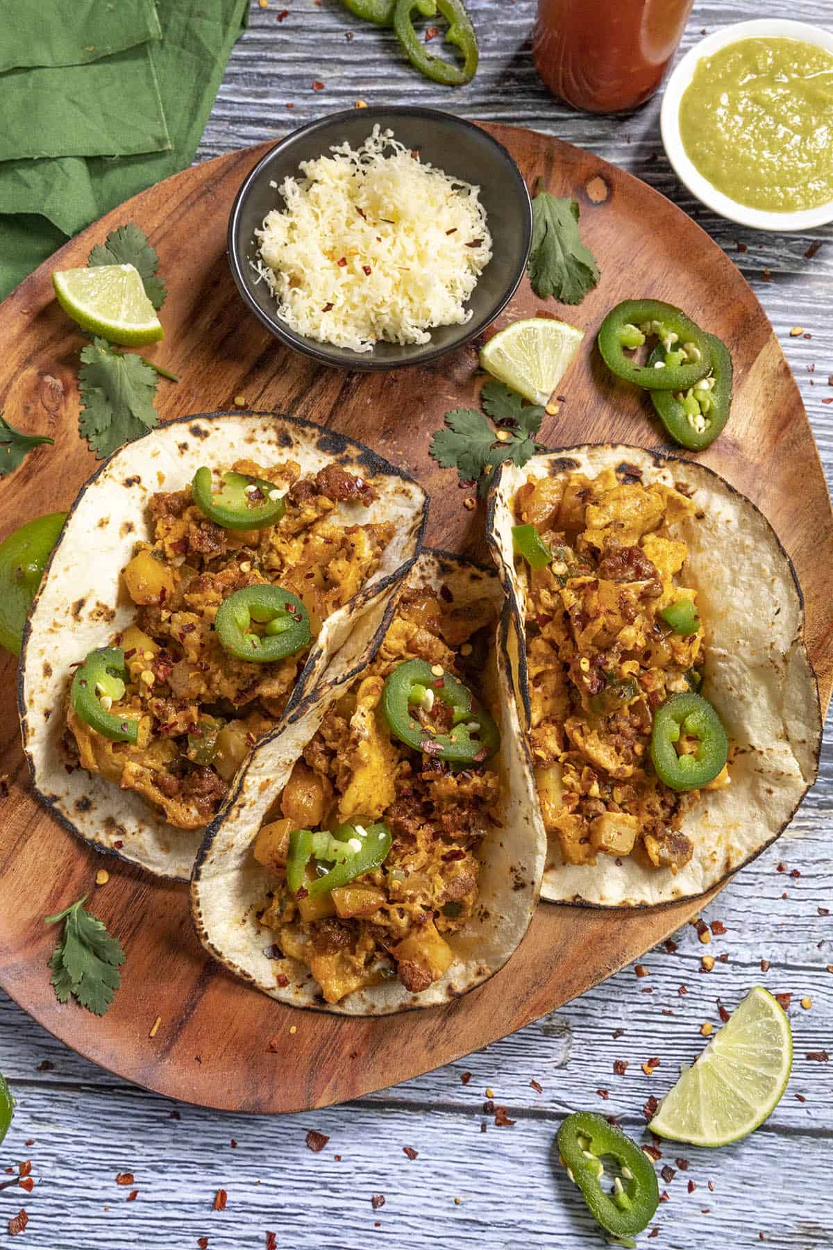 Spicy Breakfast Tacos garnished with jalapeno slices