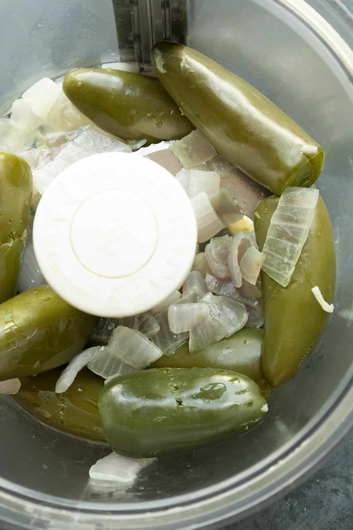 Creamy Jalapeno Sauce ingredients in a food processor, ready to process