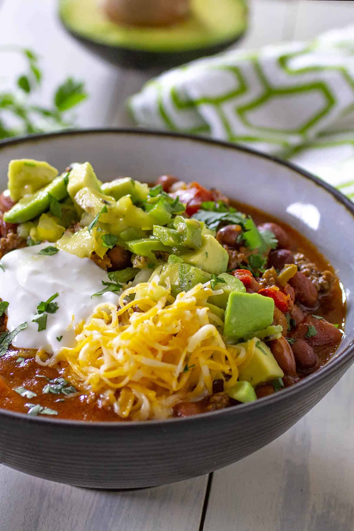 Crock Pot Taco Soup in a bowl with lots of fixings